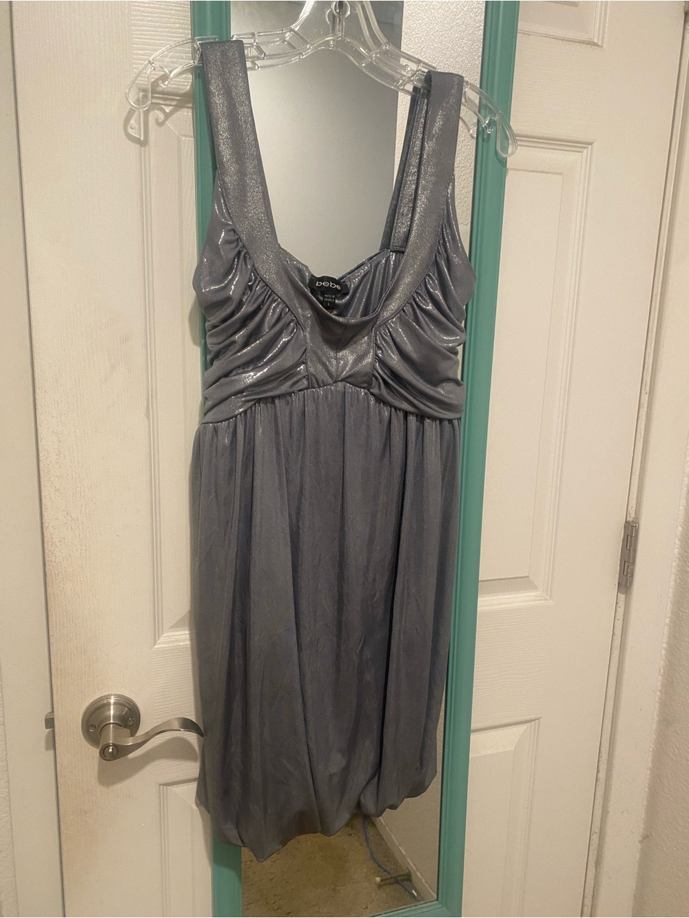 Woman’s silver sparkly dress